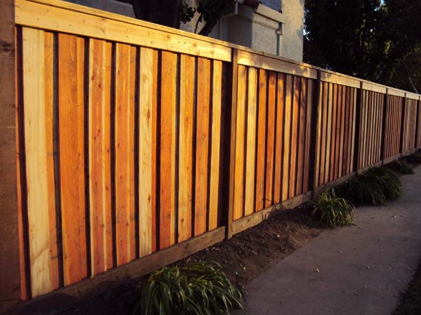 custom fence with overlapped fence boards 
