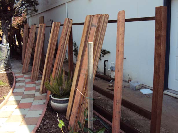 fence with 6 inch pressure-treated kickboard